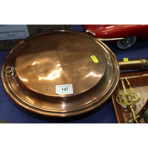 147 - A copper warming pan with turned wood handle, a copper kettle, a copper water jug, a pair of brass c... 