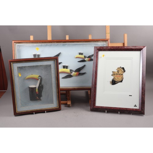 258 - A set of three Guinness toucans, in frame, a 