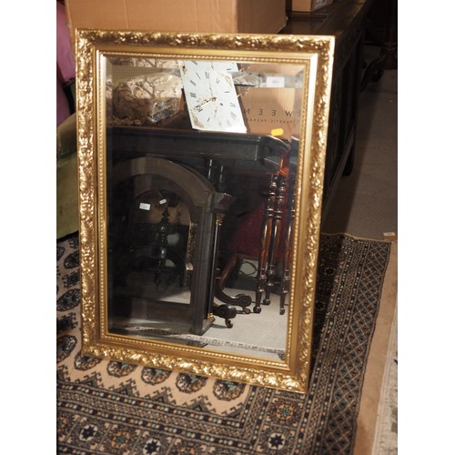 483 - A gilt framed wall mirror with bevelled plate, 19