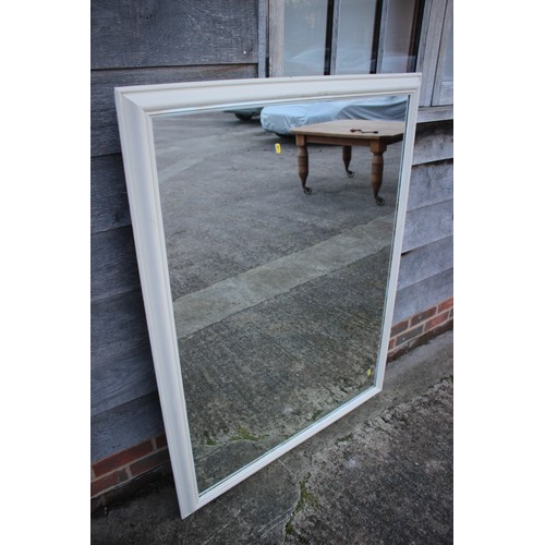 567 - A white painted frame wall mirror, plate 35