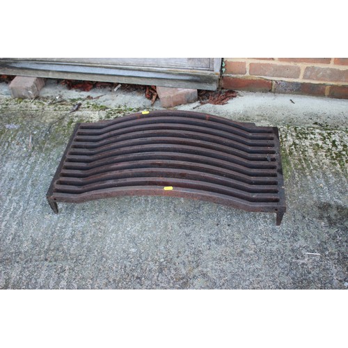 572 - A cast iron fire grate, 29