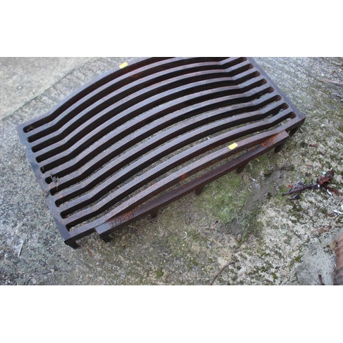 572 - A cast iron fire grate, 29