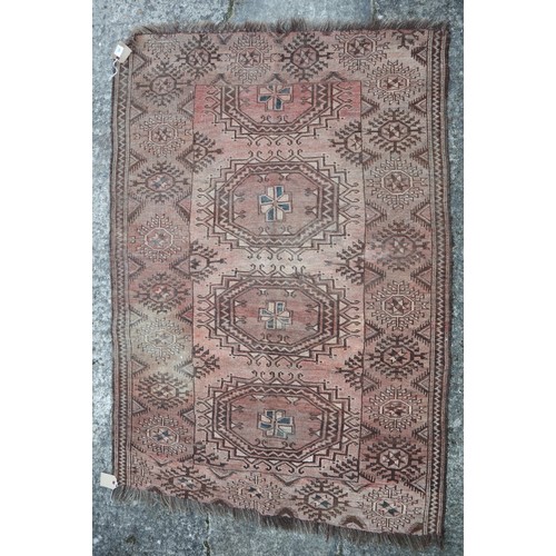 584 - A Bokhara rug of traditional design, 74