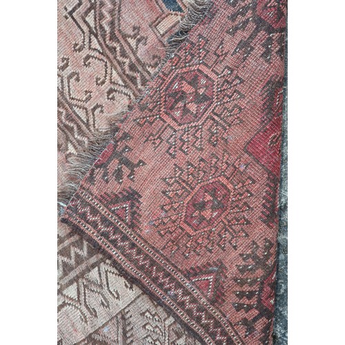 584 - A Bokhara rug of traditional design, 74