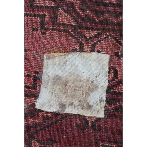 584 - A Bokhara rug of traditional design, 74