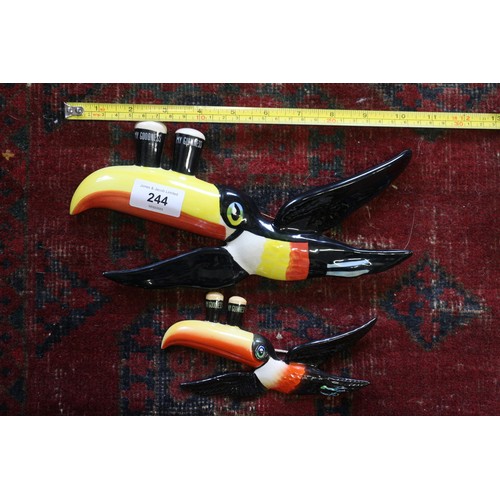 244 - A set of three Carltonware Guinness flying toucan wall plaques, and another set (two toucans with br... 