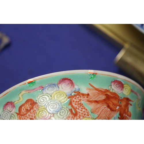 97 - A Chinese famille verte bowl with dragon, coy carp and floral polychrome decoration, four-character ... 