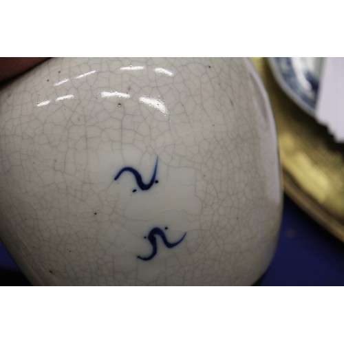 111 - A Chinese blue and white crackle glazed ginger jar with floral decoration, and associated carved har... 