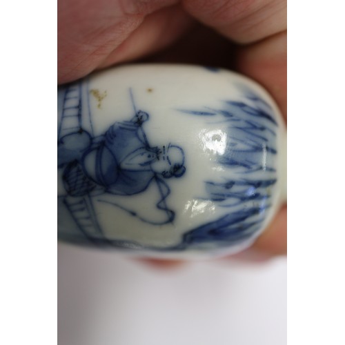 114 - A Chinese blue and white snuff bottle with figure in a landscape decoration, an Imari ribbon plate, ... 