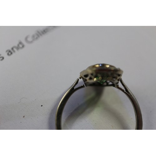 358 - A white metal ring, set demantoid garnet, 2ct approx, and rose diamond collar