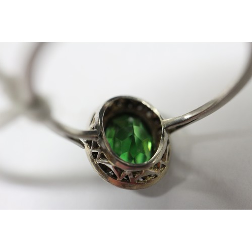 358 - A white metal ring, set demantoid garnet, 2ct approx, and rose diamond collar