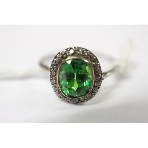 358 - A white metal ring, set demantoid garnet, 2ct approx, and rose diamond collar