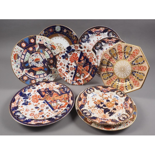 10 - A pair of Derby Imari dinner plates, a pair of Ridgways 