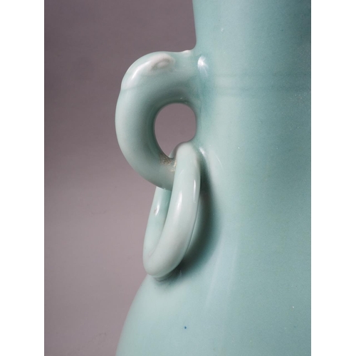 101 - A Chinese celadon glazed vase with mask and ring handles, 11