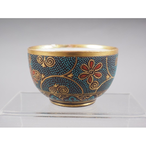 104 - A Japanese miniature bowl with interior verse and landscape decoration and exterior enamelled floral... 