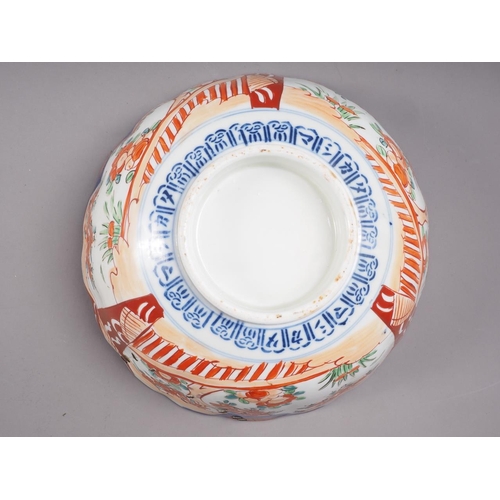 105 - An Imari pattern bowl, 10 3/4