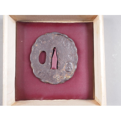 109 - A Japanese Edo period iron Tsuba decorated Noh mask, 2 1/2