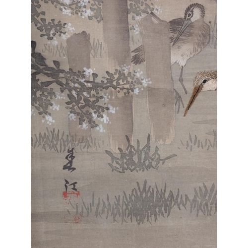 122 - A Japanese watercolour scroll with embroidered storks, 24 3/4