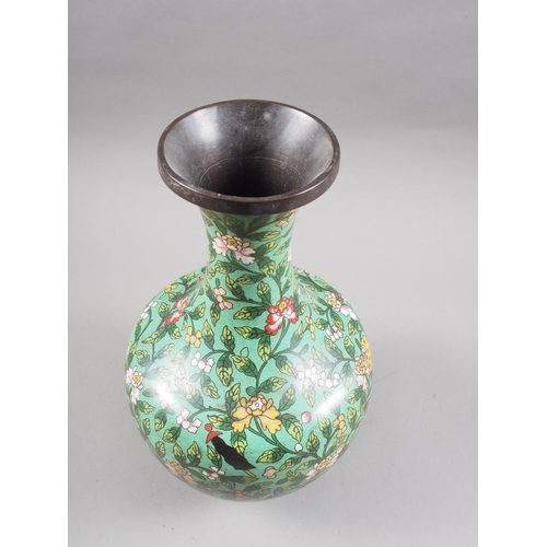 126 - A Chinese cloisonne vase with all-over floral and precious objects decoration on a green ground, 12 ... 