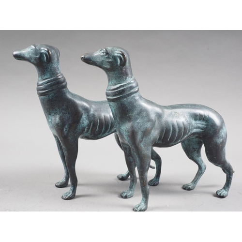 145 - A pair of patinated dogs, 7