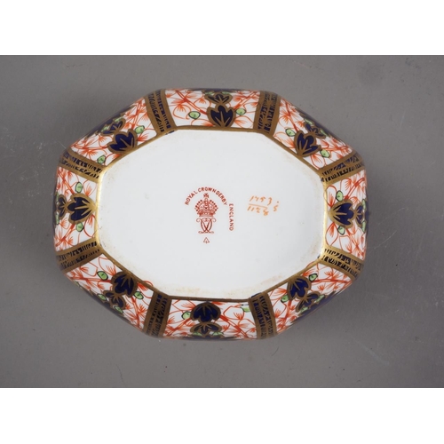 15 - A Royal Crown Derby bone china Imari octagonal box and cover, 4 1/2