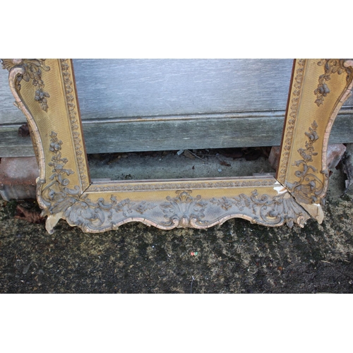 158 - An ornate gilt picture frame, 31