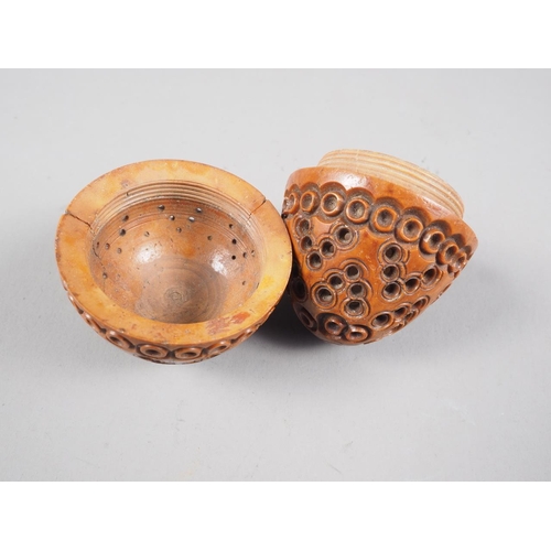 161 - A 19th century turned, carved and pierced coquilla nut pomander, 2 1/2