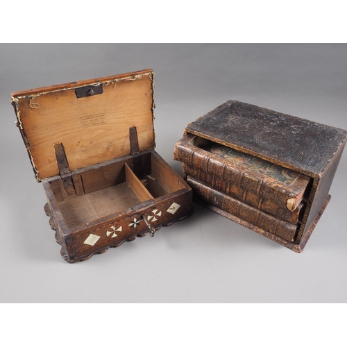 166 - An early 20th century bone and ebony inlaid hinged box with upholstered top, 11 1/2