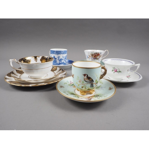 21 - A late 19th century bird decorated cabinet cup and saucer (restored handle), and other cabinet cups ... 