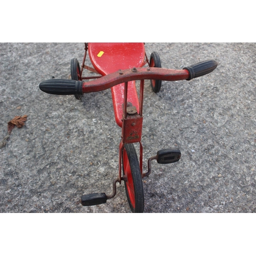 210 - A Tri-ang red painted tricycle, 19