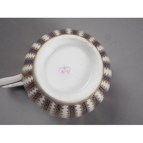 23 - A Royal Crown Derby Kakiemon style cabinet cup and saucer, an early 19th century Derby trio, a tea b... 