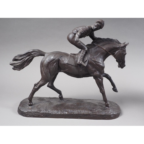 232 - A patinated composition model of a rearing horse, 22 1/2