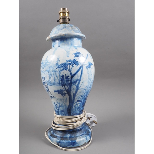 262 - A Delft baluster table lamp with children playing in a landscape decoration