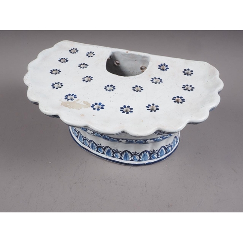 29 - A Delft blue and white semicircular tulip stand, 9 1/2