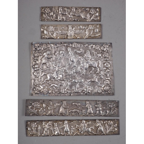 298 - Five Persian embossed white metal plaques with figure and animal decoration