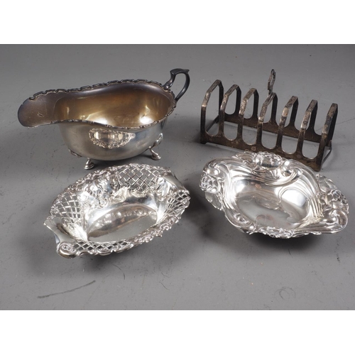 306 - A silver sauce boat, 3oz troy approx, a silver six-division toast rack, 2.2oz troy approx, a silver ... 