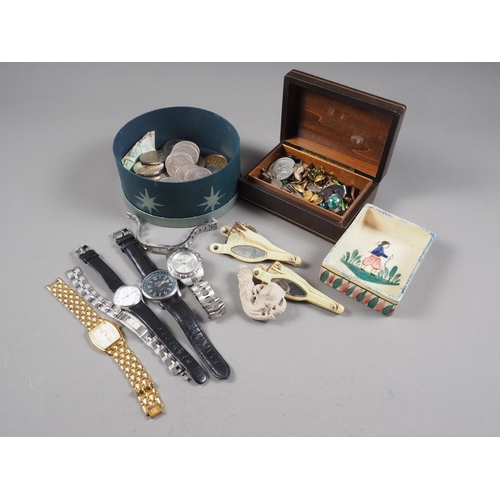 335 - A quantity of commemorative crowns and other coins, gentleman's wristwatches, badges, cufflinks and ... 