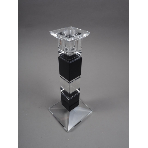 36 - A 1960s black and clear glass candlestick, on square base, 8