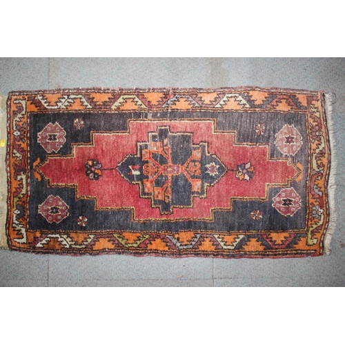 649 - A Kazak design mat with single gul on a red ground, 38