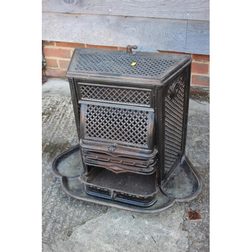 667 - A French enamelled cast iron wood burner, 20