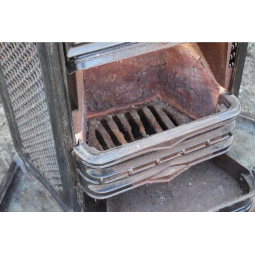 667 - A French enamelled cast iron wood burner, 20