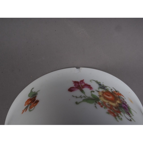 68 - A Continental shaped dish with floral decoration, 10