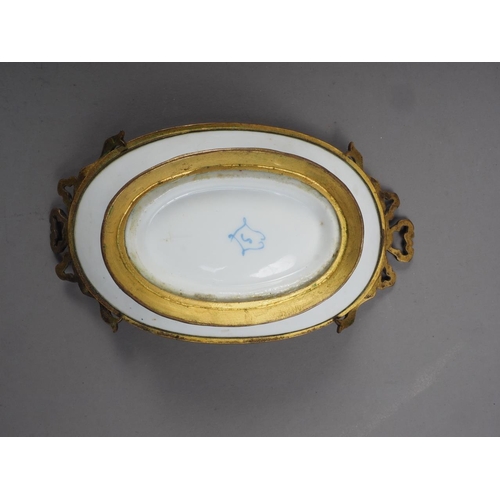 68 - A Continental shaped dish with floral decoration, 10