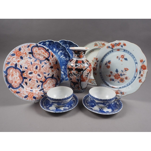 87 - An 18th century Chinese export plate, a similar plate and other Oriental ceramics (chips and repairs... 