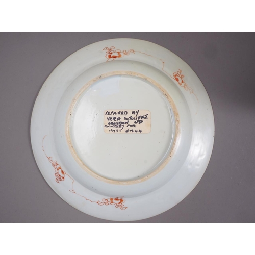 87 - An 18th century Chinese export plate, a similar plate and other Oriental ceramics (chips and repairs... 