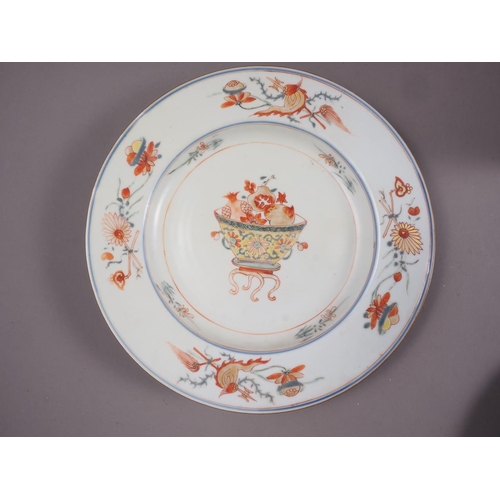 87 - An 18th century Chinese export plate, a similar plate and other Oriental ceramics (chips and repairs... 