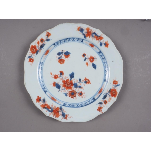 87 - An 18th century Chinese export plate, a similar plate and other Oriental ceramics (chips and repairs... 