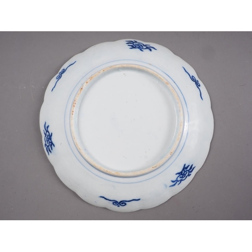 87 - An 18th century Chinese export plate, a similar plate and other Oriental ceramics (chips and repairs... 