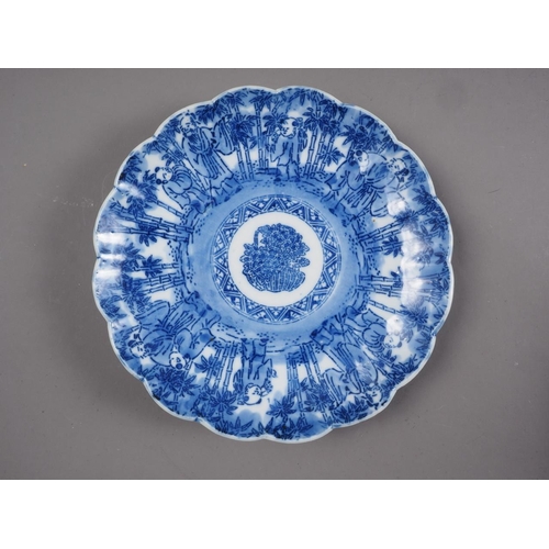 87 - An 18th century Chinese export plate, a similar plate and other Oriental ceramics (chips and repairs... 