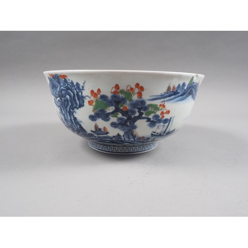 89 - Two Chinese blue and white bowls with later clobbered decoration, larger 8 1/2